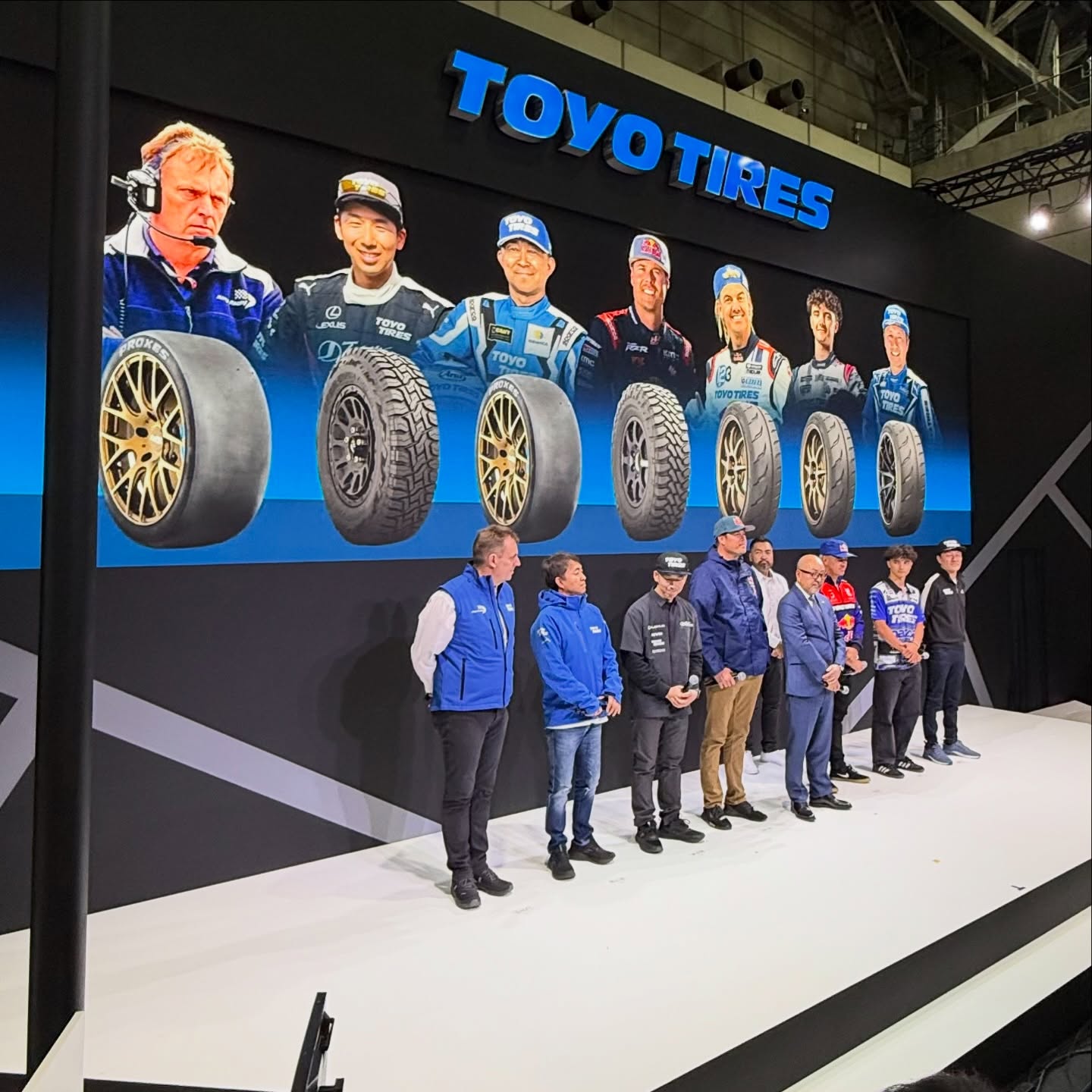 Instagram post by @brycemenzies7 for Toyo Tires. Caption reads: #TBT to @tokyo_autosalon_official with @toyotires....