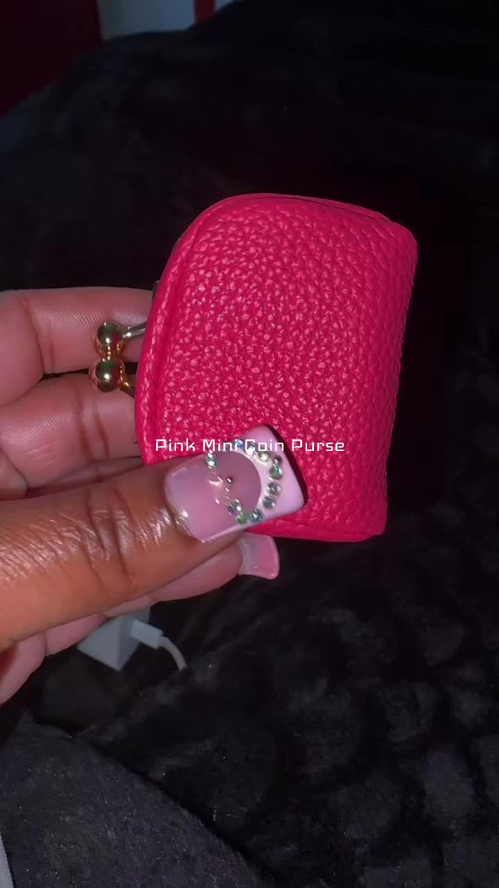 TikTok post by @_kenyierra_ for Royal Bagger. Caption reads: Pink coin purse from @ROYAL BAGGER US 🎀💕✨.