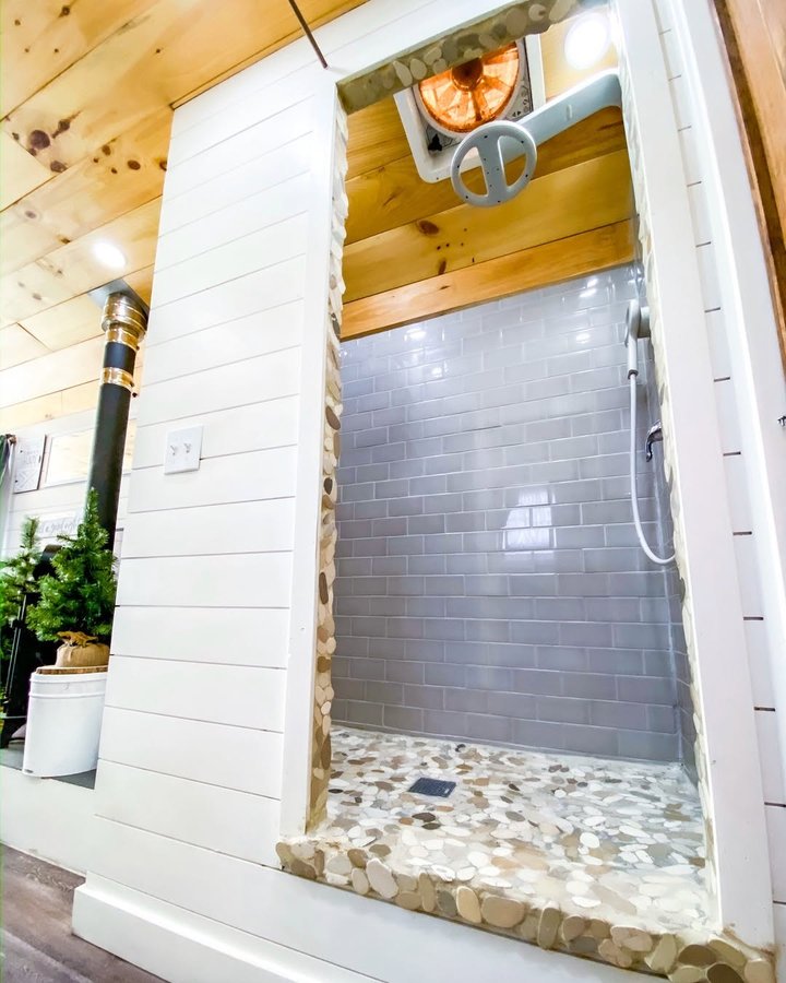 Instagram post by @happyhomebodies for Hunker. Caption reads: Shower talk! Raise your hand if you love....