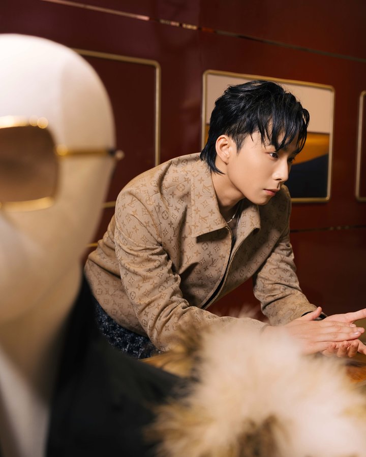 Instagram post by @wokeupat4am.444 for Louis Vuitton. Caption reads: [...] @louisvuitton.