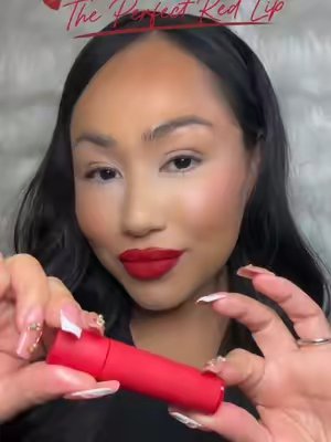 TikTok post by @_xo_karii for Espoir USA. Caption reads: [...] red lip!💋 This is "The Red" by @espoir USA....
