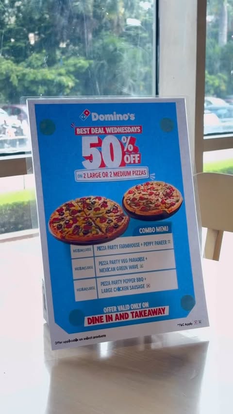 Instagram post by @_ankanaaaa_ for Domino's Pizza. Caption reads: #ad Why wait for the weekend when Wednesday comes....