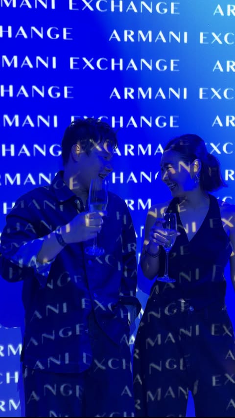 Instagram post by @oumboonnnn for Armani Exchange. Caption reads: Here to celebrate @armaniexchange #ArmaniExchange....