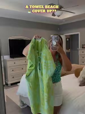 TikTok post by @kittykass04 for Sand Cloud. Caption reads: @Sand Cloud #sandcloud #coverup #towel #functional.