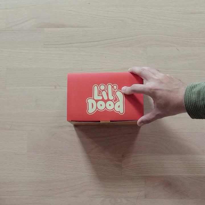 Instagram post by @codyabanks for StickerApp. Caption reads: Sending out the first batch of Lil’ Doods today.....