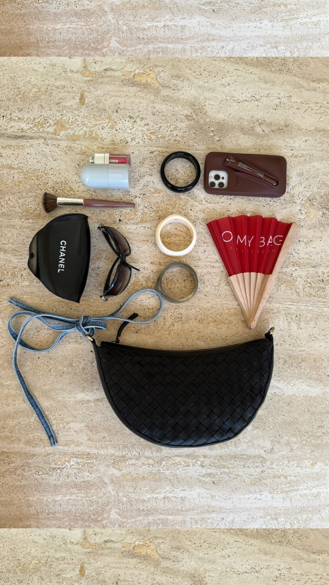 Instagram post by @fiahamelijnck for O My Bag. Caption reads: what’s in my @omybagamsterdam ? festival edition.....