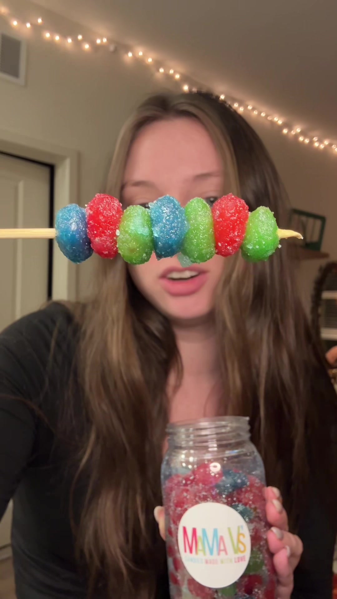 TikTok post by @emmarosetoess for Mama V’s Candy. Caption reads: [...] just hit the spot #sourgushers #mamav....