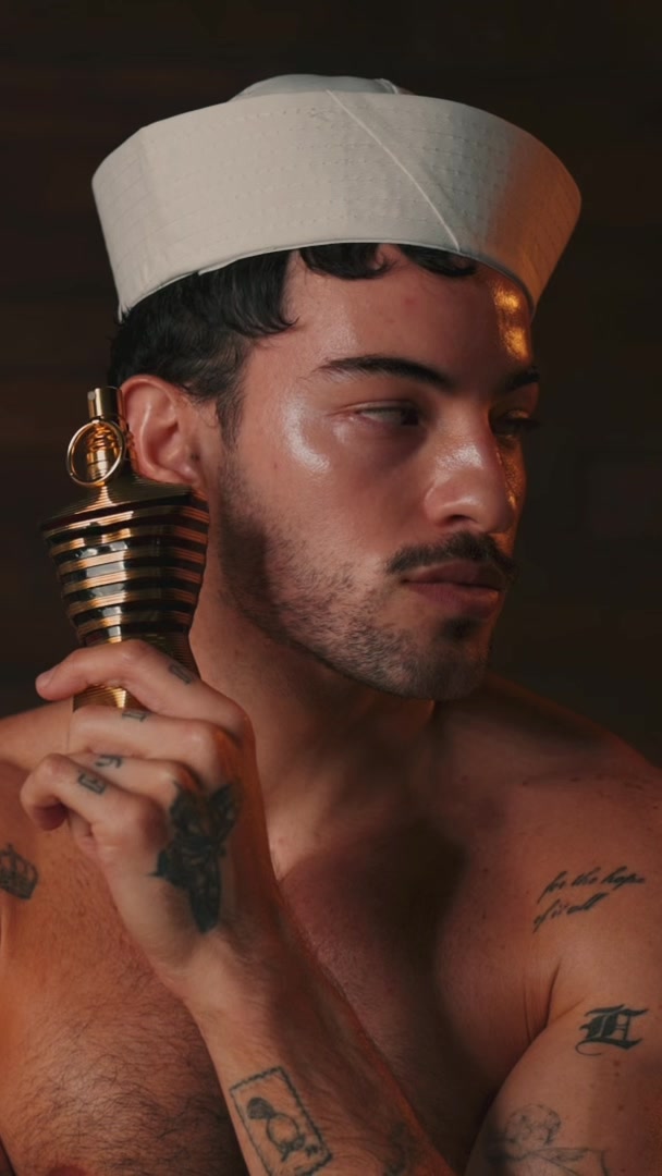 TikTok post by @boynamedluis for JeanPaulGaultier. Caption reads: one last spritz? @JeanPaulGaultier  @Ulta Beauty....