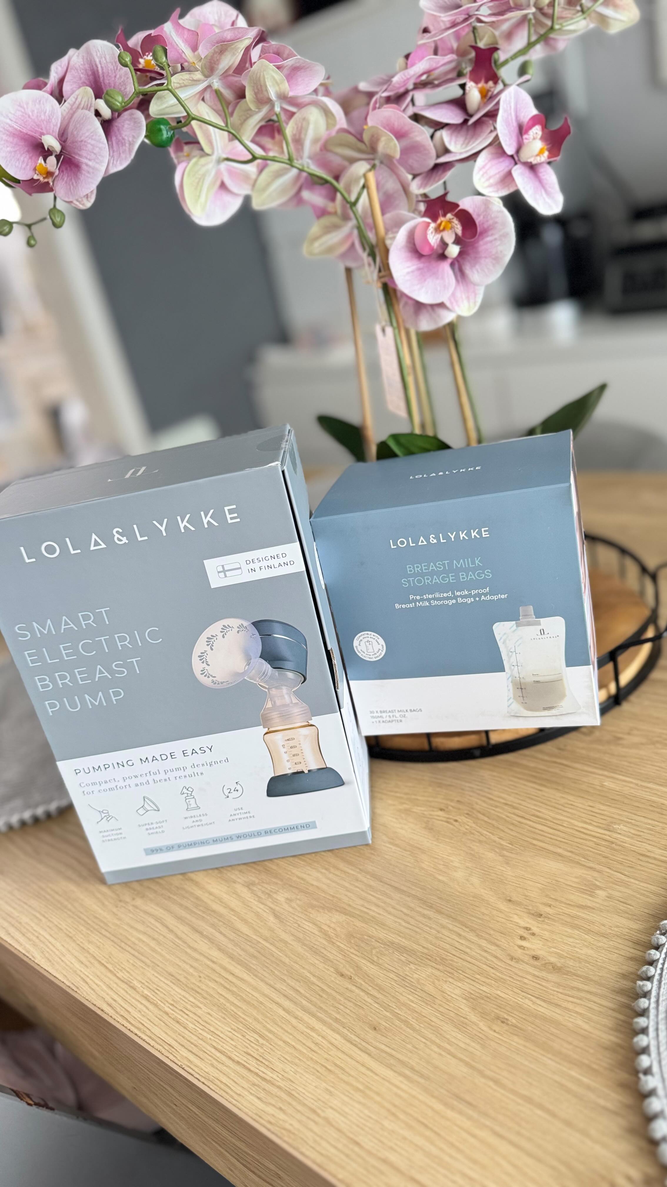 Instagram post by @mommabeatrice for Lola&Lykke. Caption reads: Breastfeeding isn’t just a mom’s job — it’s a team....