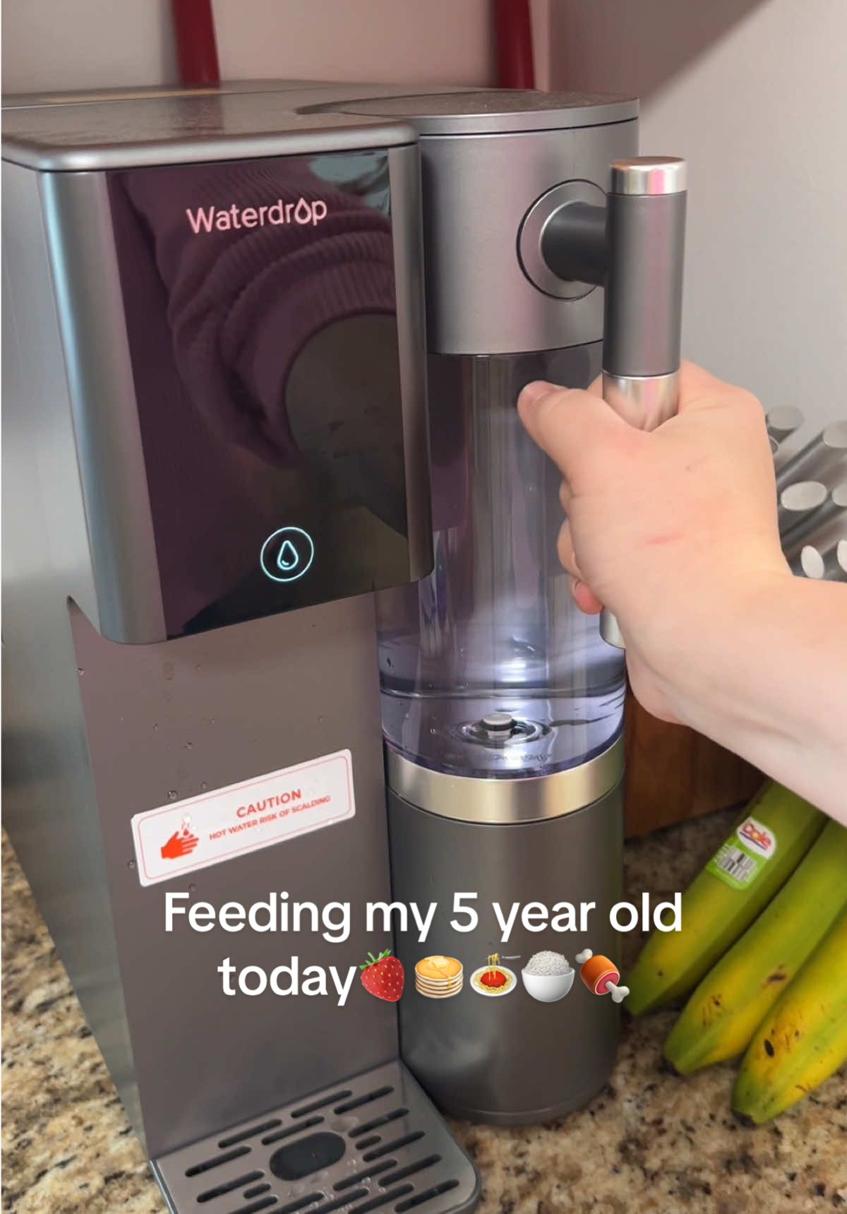 TikTok post by @laura_lucks for Waterdrop Filter. Caption reads: [...] Reverse Osmosis System!🍓🥞🍝🍚🍖 @Waterdrop....