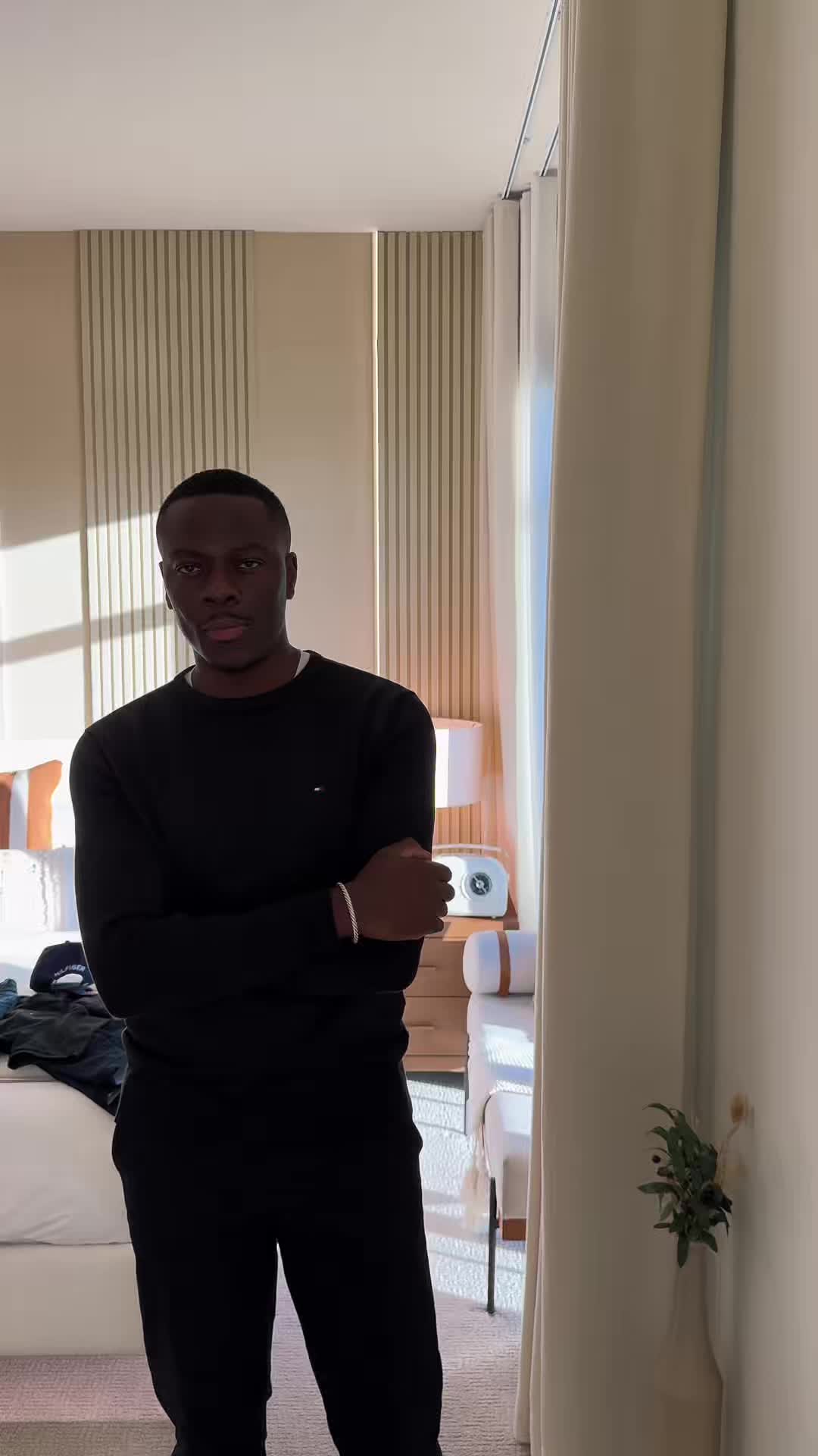 TikTok post by @akannikamal for Tommy Jeans. Caption reads: Hosting and keeping it comfortable yet chic in....