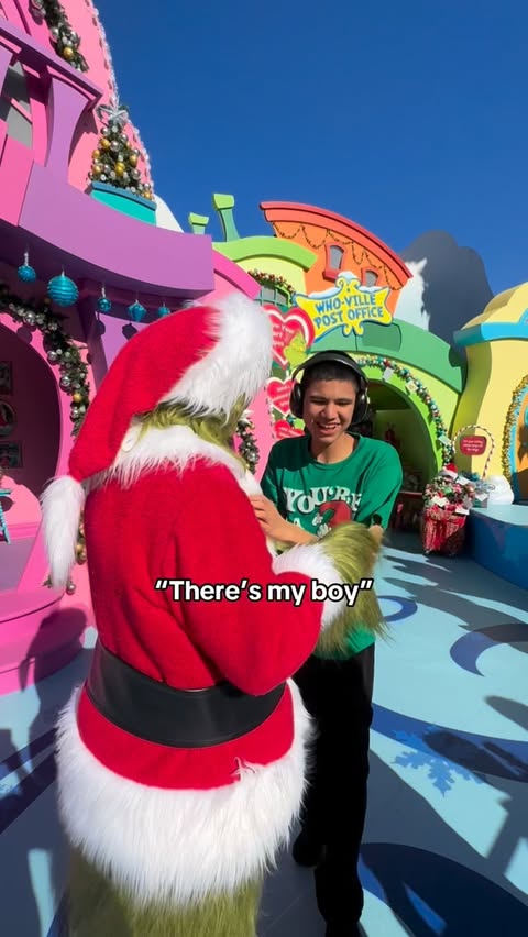 Instagram post by @magicwiththomas for Universal Studios Hollywood. Caption reads: The Grinch calling Thomas his Tom-Tom

#autism....