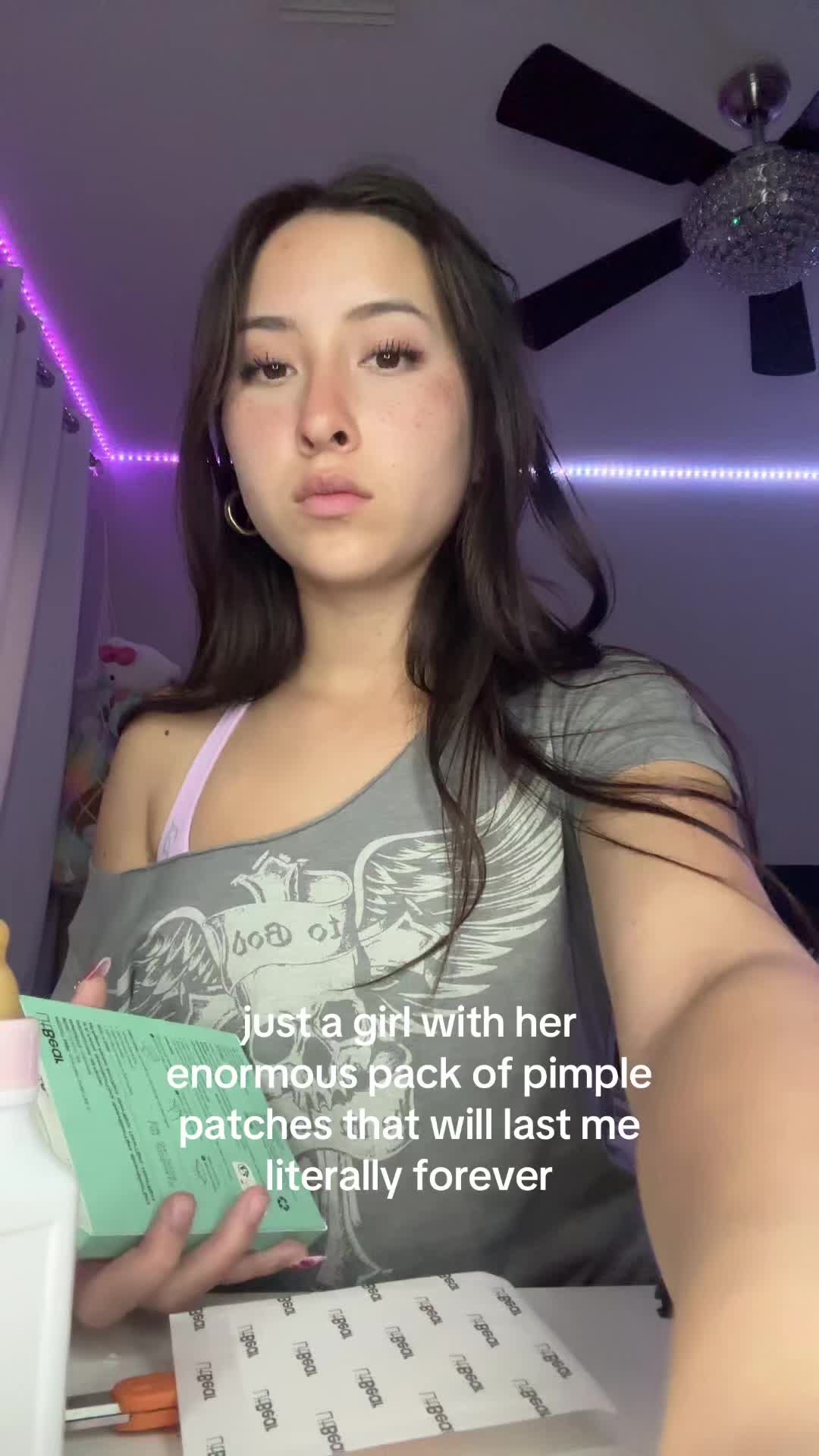 TikTok post by @lihuasspam for LitBear. Caption reads: [...] #acne #acnepatch #freeshipping....