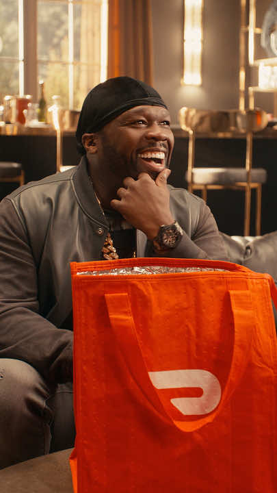 TikTok post by @50cent for DoorDash. Caption reads: Good thing @DoorDash has beef (and everything....