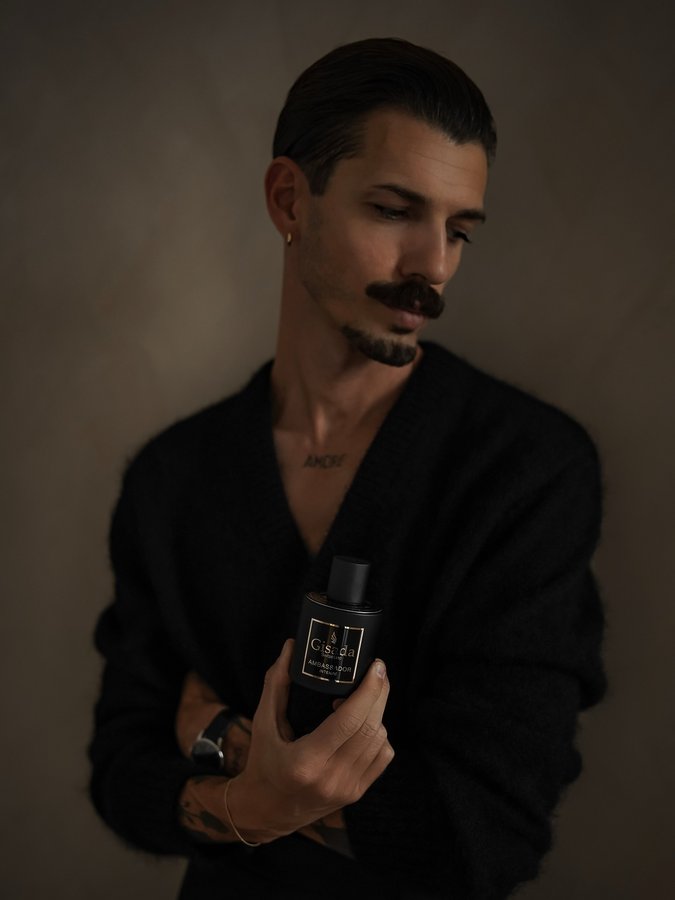 Instagram post by @manuel.fiori for Gisada. Caption reads: Dark tones, bold presence. @gisadaofficial....