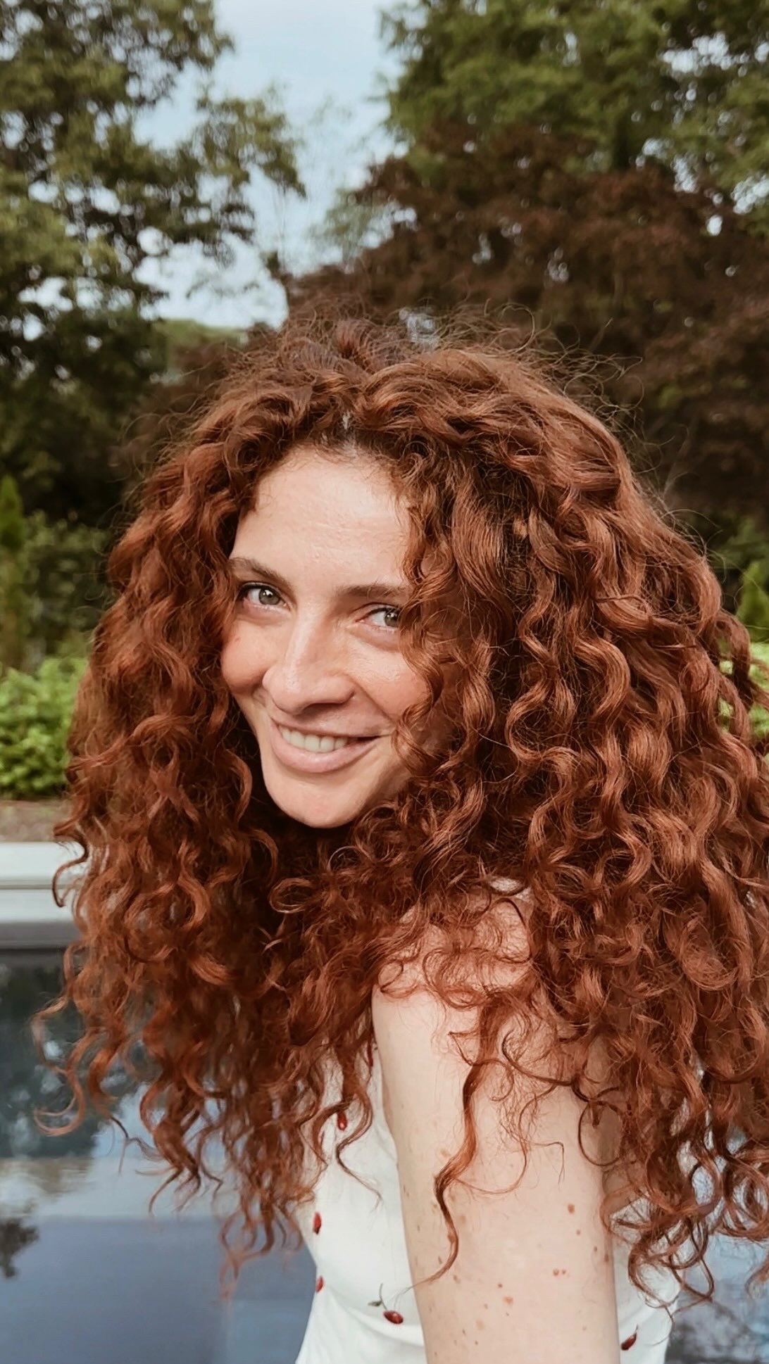 Instagram post by @sallomegulua for DevaCurl. Caption reads: Partnered with @devacurl 💚

DevaCurl’s....