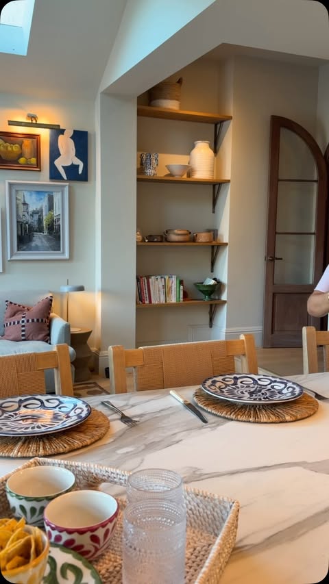 Instagram post by @studiokp.interiordesign for Pottery Barn. Caption reads: AD A weeknight dinner at home with @potterybarnuk....