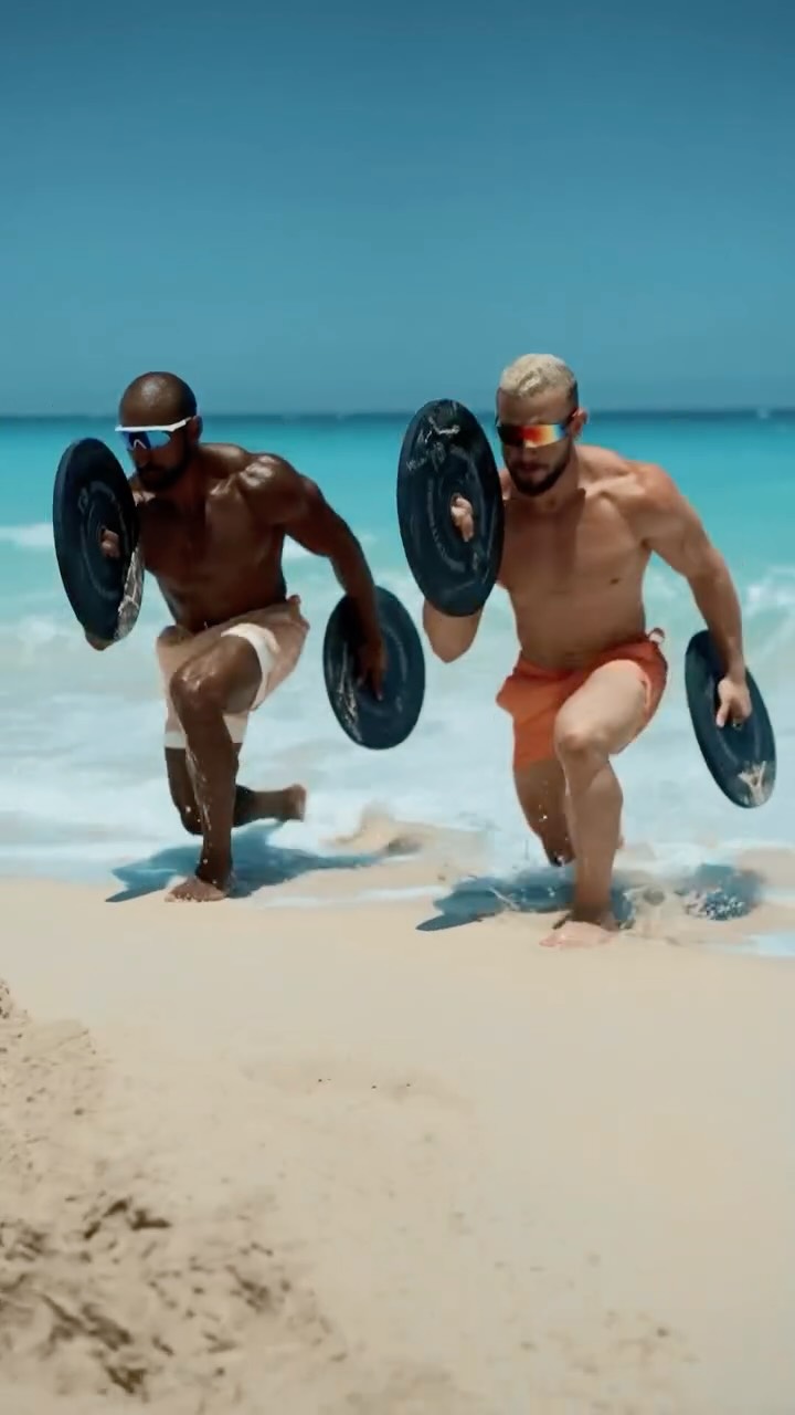 Instagram post by @karim_h_ebied for SQUATWOLF. Caption reads: [...] plates, sandy gains 🏖️🌊💪🏼

. 🩳:....