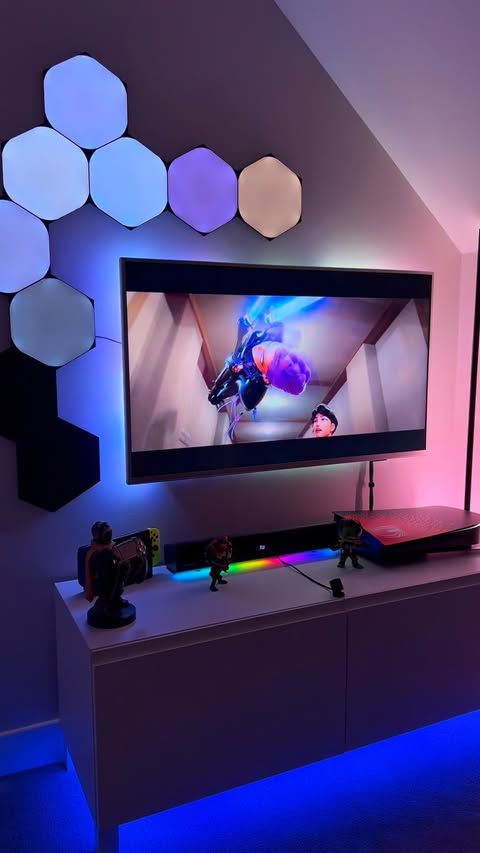 Instagram post by @stommagames for Nanoleaf. Caption reads: My son’s new setup is finally complete with a huge....