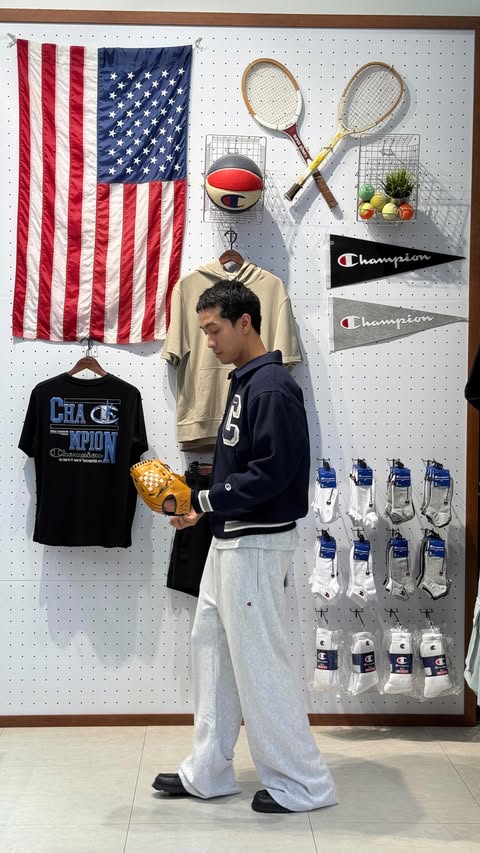 Instagram post by @parkphoom for Champion. Caption reads: Since 1919, Champion has been part of American....