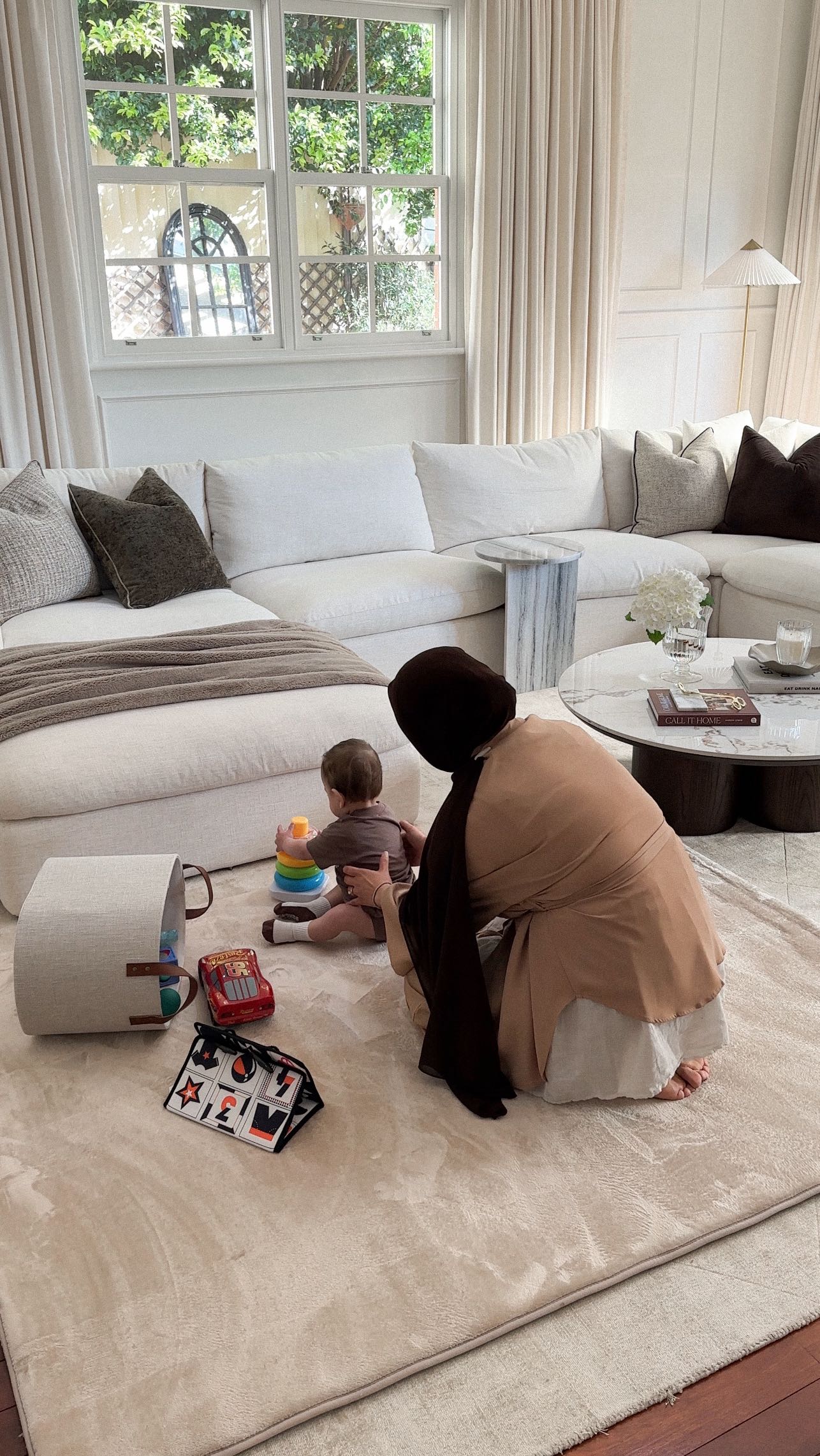 Instagram post by @dusk2illdawn for Miss Amara. Caption reads: We absolutely love our plush Rollie pollie playmat....