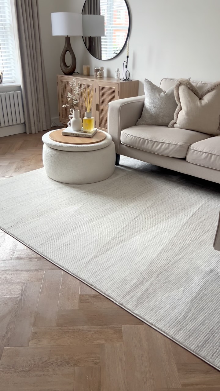 Instagram post by @homewithlucyk for The Rugs. Caption reads: Living room changes🤍

Effortlessly elegant &....