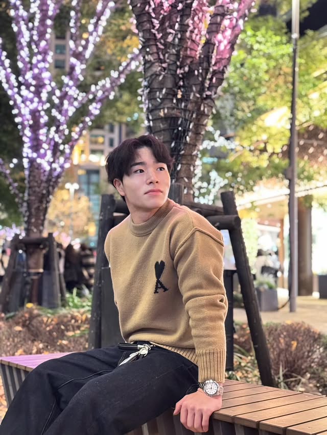 Instagram post by @shinnosuke_1031 for NORQAIN. Caption reads: Underneath the Christmas lights with....