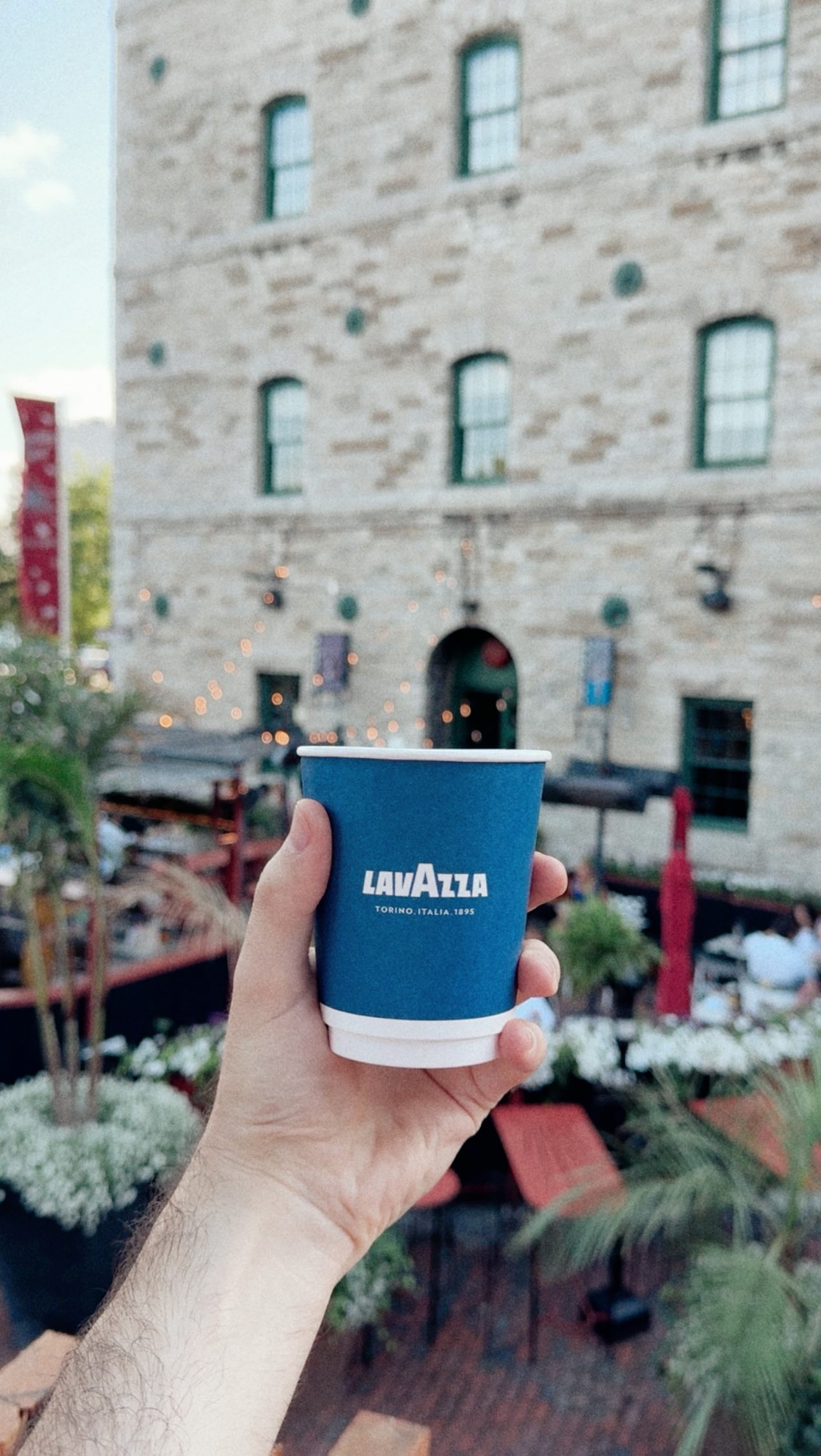 Instagram post by @andrewcretaro for Lavazza. Caption reads: Every summer, I make it a tradition to attend the....