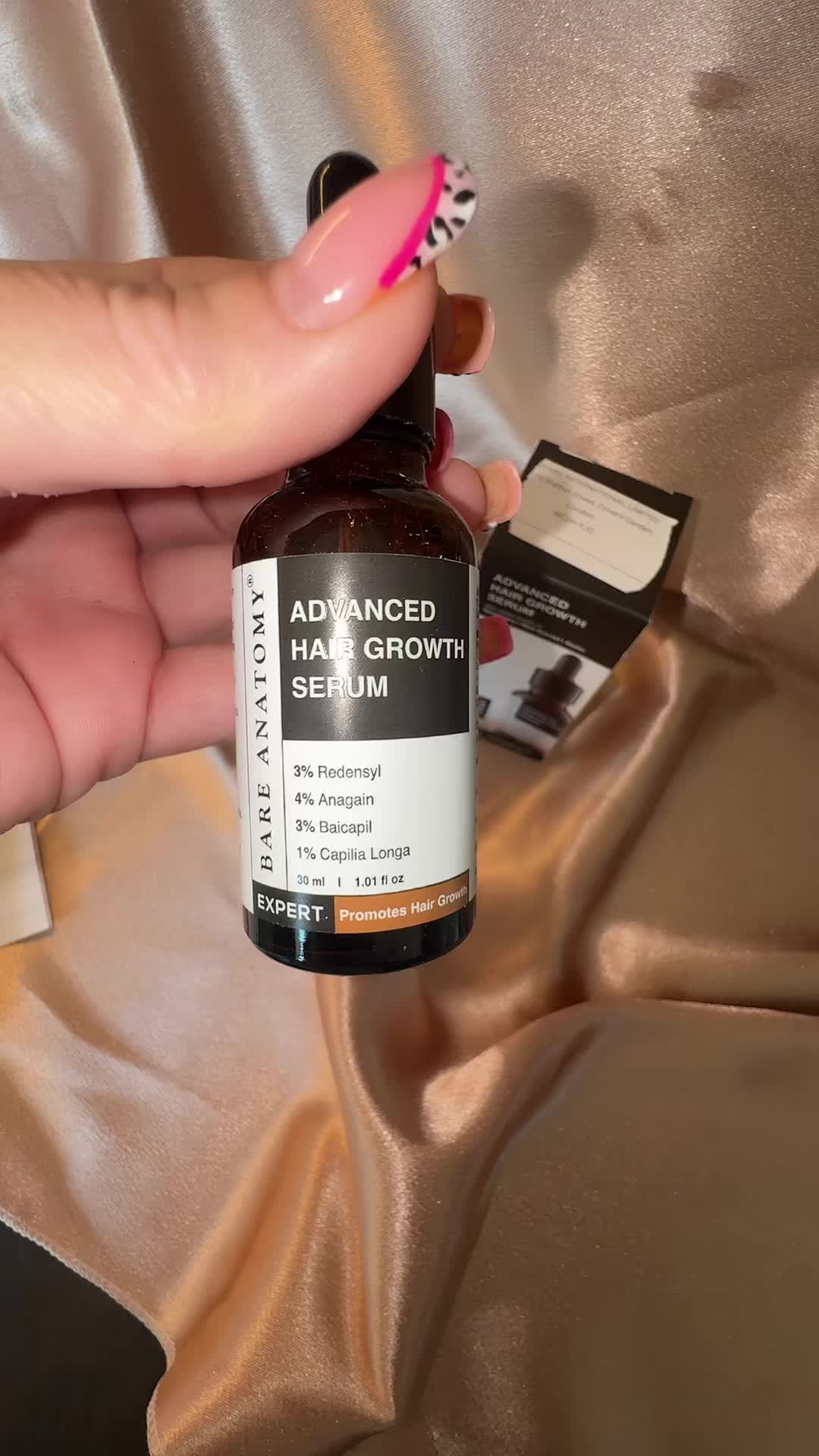 TikTok post by an influencer for Bare Anatomy. Caption reads: [...] feels nice to use, the Bare Anatomy Advanced....