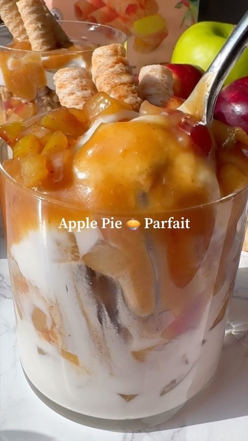 Instagram post by @eatingbyelaine for Cha's Organics. Caption reads: APPLE PIE PARFAITS 🍎🍏🥥 Comment “APPLE” for the....
