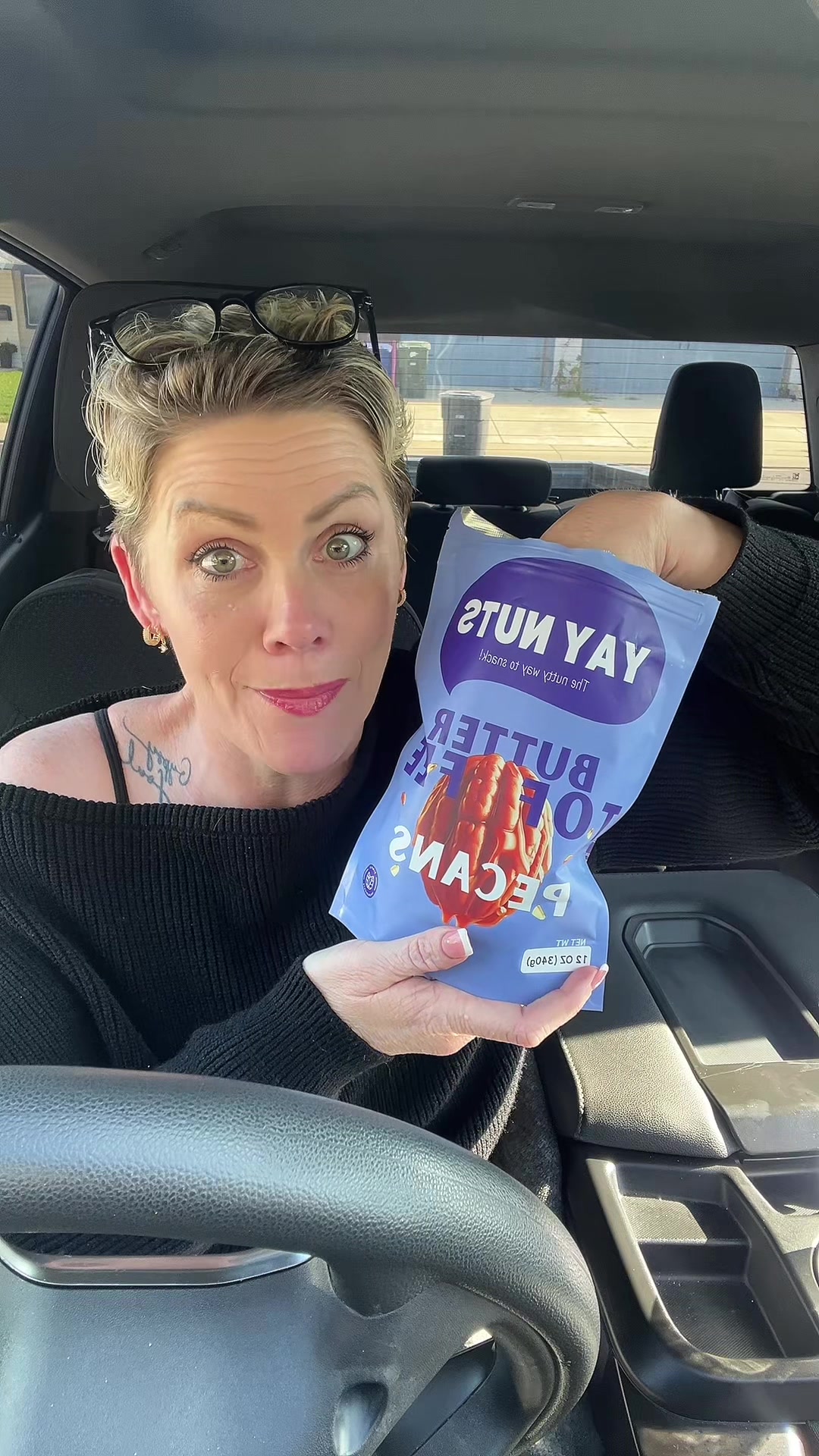 TikTok post by @outofmychell for Yay Nuts. Caption reads: [...] butter toffee pecans cuz they are 🔥@yaynuts....