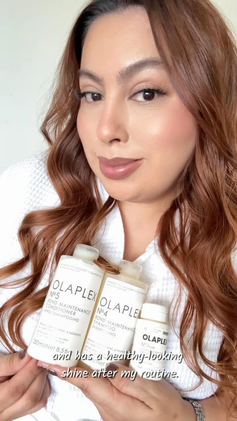 Instagram post by @monicaloza82 for OLAPLEX. Caption reads: [...] shinier, healthier-looking hair with my....