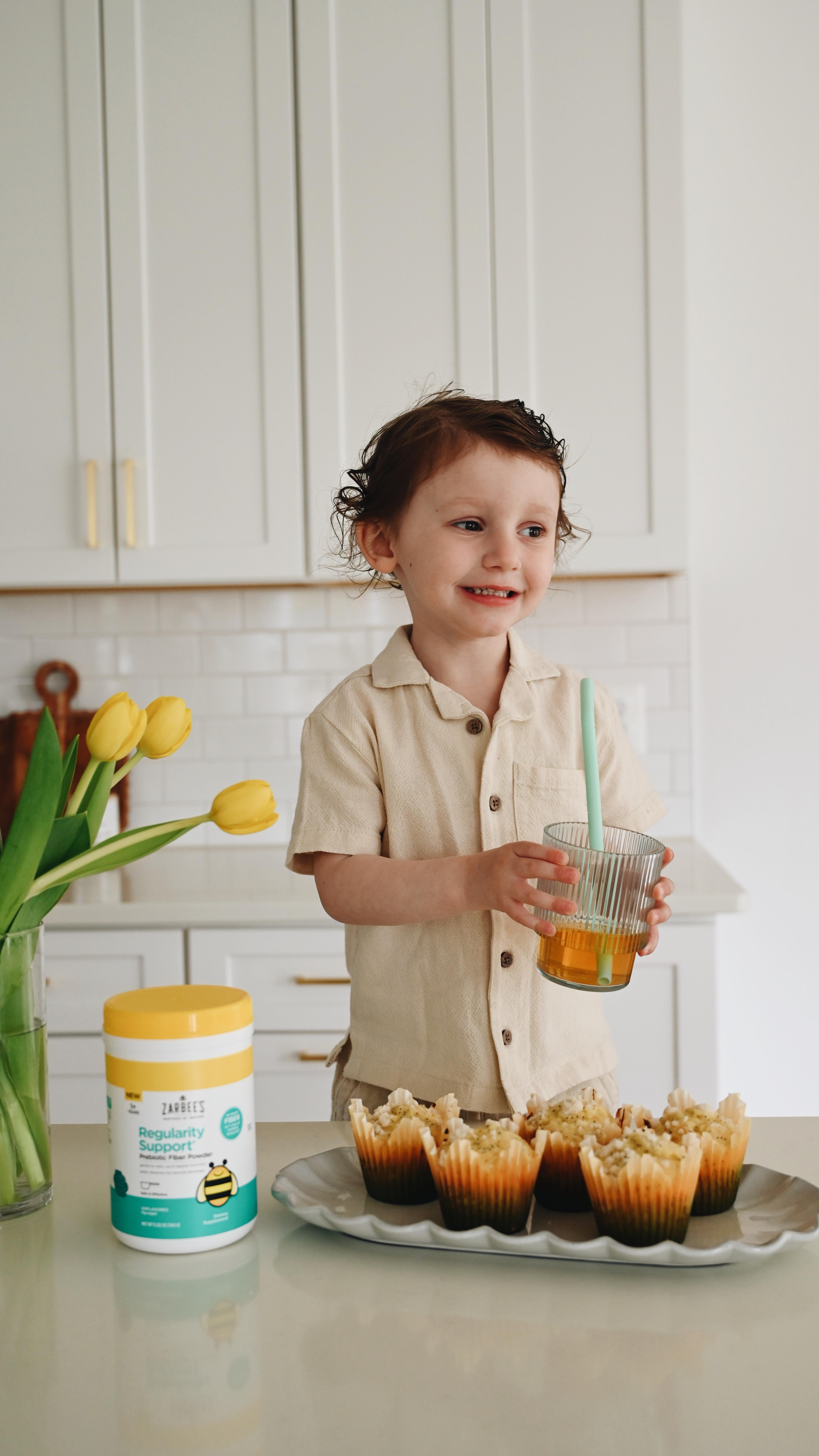 Instagram post by @emilywondree for Zarbee's. Caption reads: #ZarbeesPartner Making memories in the kitchen....