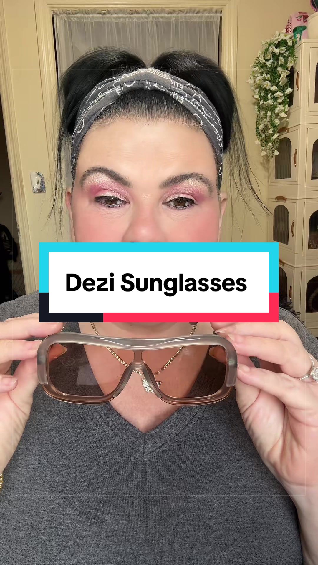 TikTok post by @tamberlynne24 for DEZI. Caption reads: [...] sunglasses I have ever owned in my life....