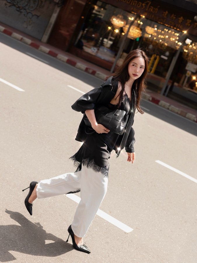 Instagram post by @buanalinthip for Jimmy Choo. Caption reads: 🖤✨ @jimmychoo 

#JimmyChoo.