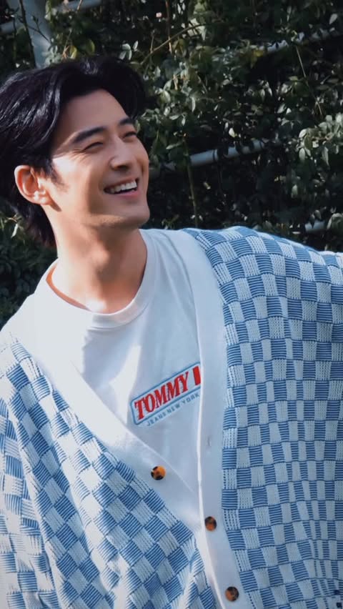 Instagram post by @jamesjhl for Tommy Jeans. Caption reads: Cardigan weather ❤️ @tommyjeans #tommyfamily.