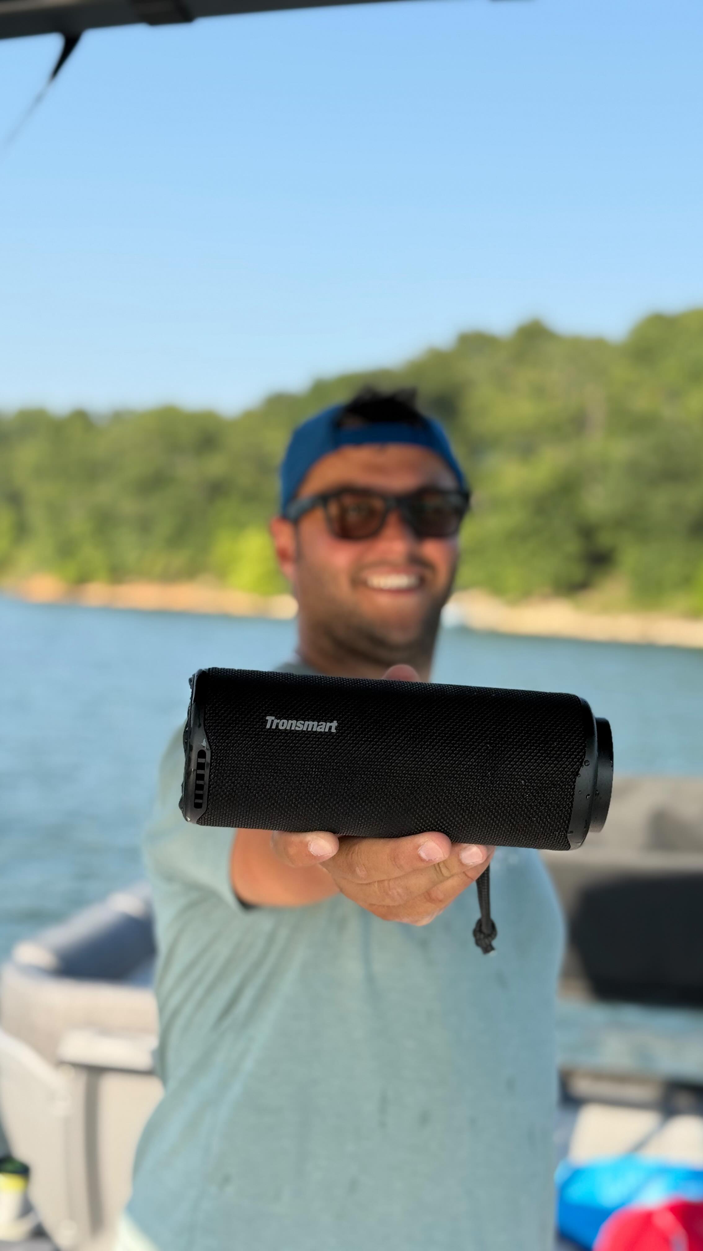 Instagram post by @iamdenizmirik for Tronsmart. Caption reads: [...] the vibes, wherever you are. 🔊My new....