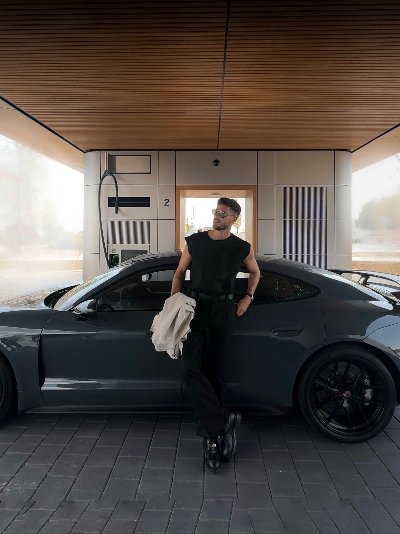 Instagram post by @kevinlutolf for Porsche. Caption reads: For those who value comfort, performance, and....