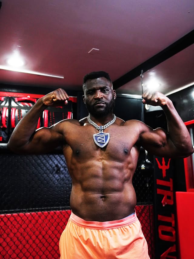 Instagram post by @francisngannou for Polymarket. Caption reads: [...] 👑 👊 #NgannouLins Trade the fight on....