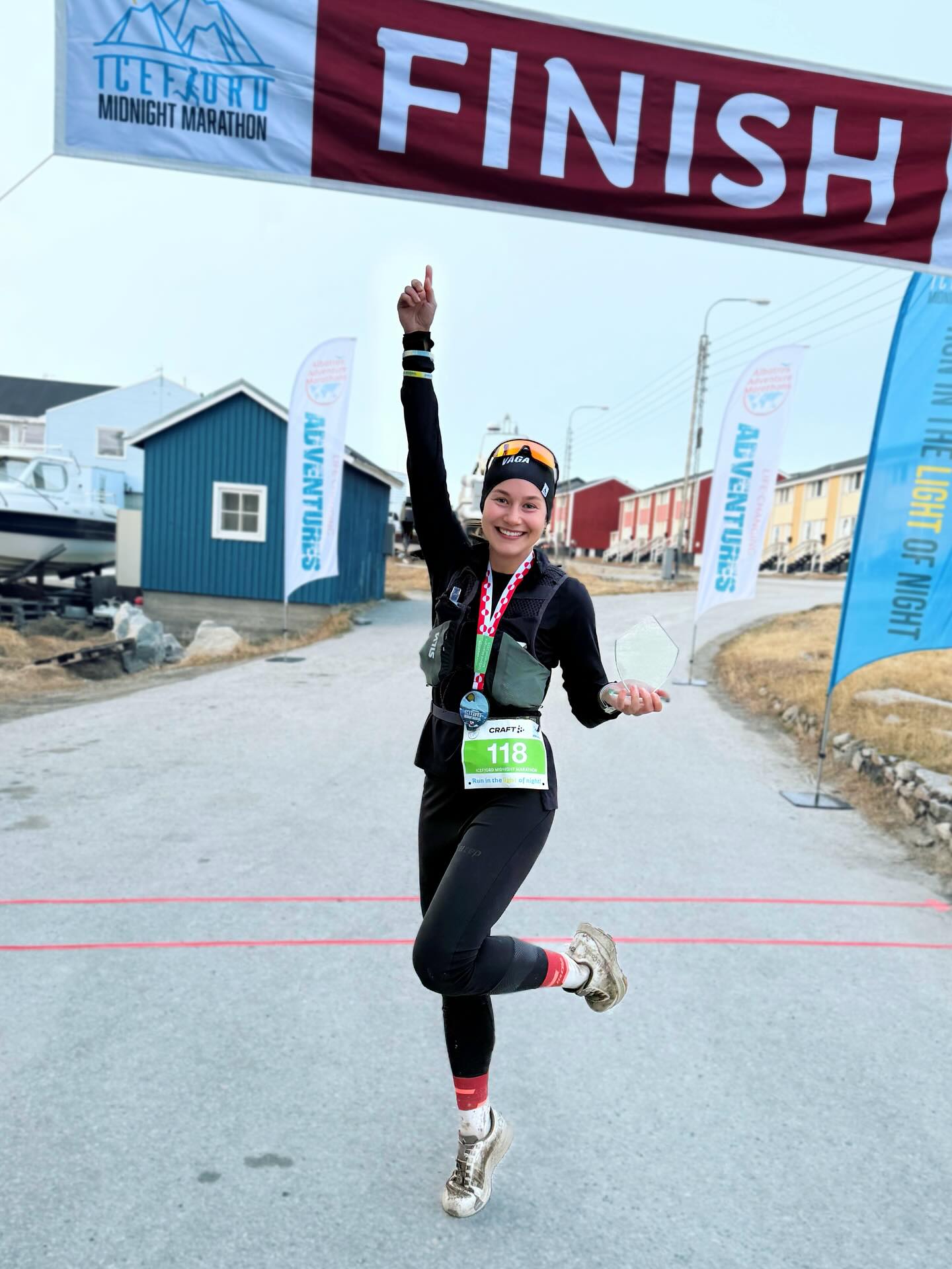 Instagram post by @running.yana for Coros. Caption reads: ICEFJORD MIDNIGHT MARATHON 🇬🇱❄️☀️
2nd female 🥈....