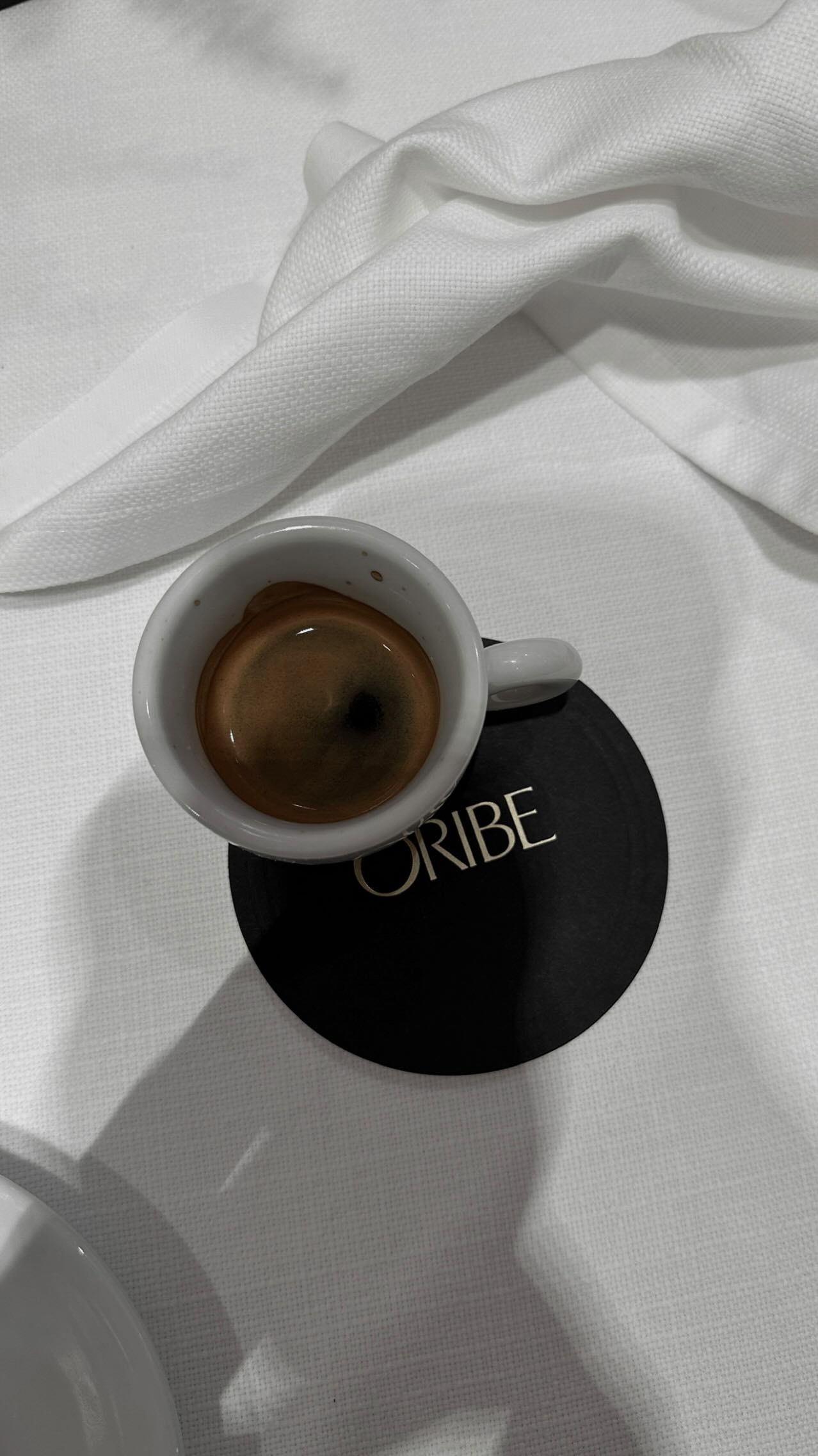 Instagram post by @victoriatornegren for Oribe. Caption reads: Advertisement - The @oribe x Kustaa Saksi Holiday....