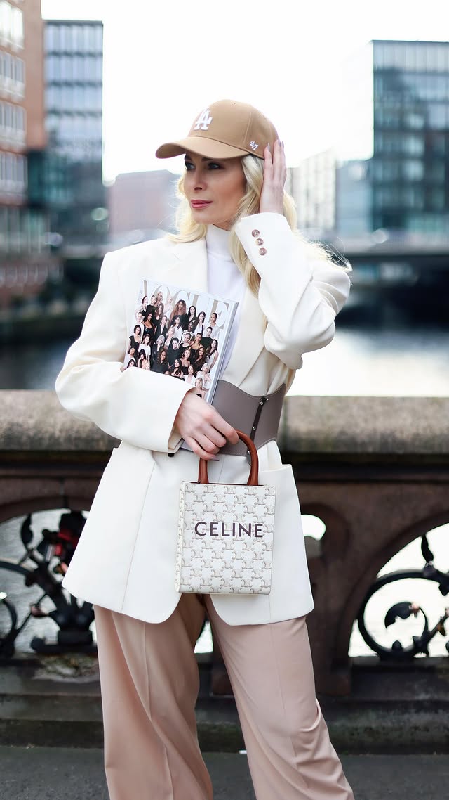 Instagram post by @osipova.studio for Nanushka. Caption reads: [...] the classic #whiteblazer 🤍🫶 from @nanushka....