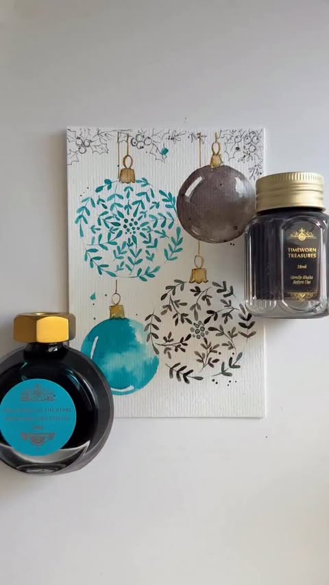 Instagram post by @simply.seema for Ferris Wheel Press. Caption reads: Ornaments in electric blue & warm brown-grey in....