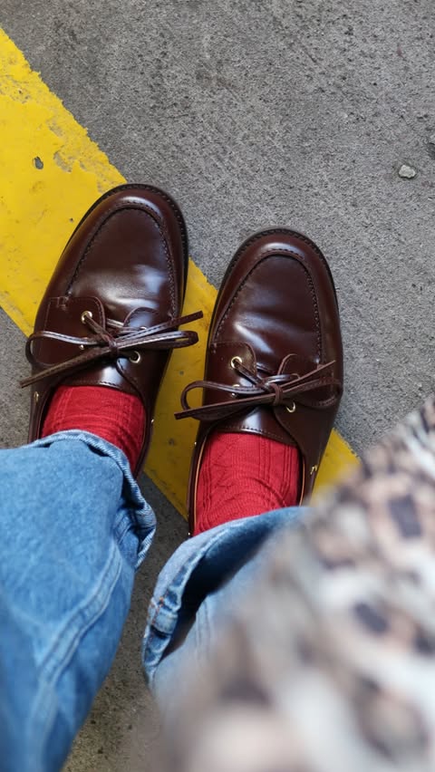 Instagram post by @goodmannersstyle for Barbour. Caption reads: [...] @marksandspencer 
Shoes @sezane 
Coat @ganni....