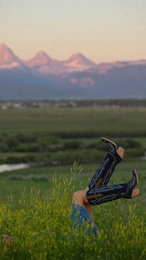 Instagram post by @frontierbound for Corral Boots. Caption reads: It’s the denim boots for me >

@corralboots.