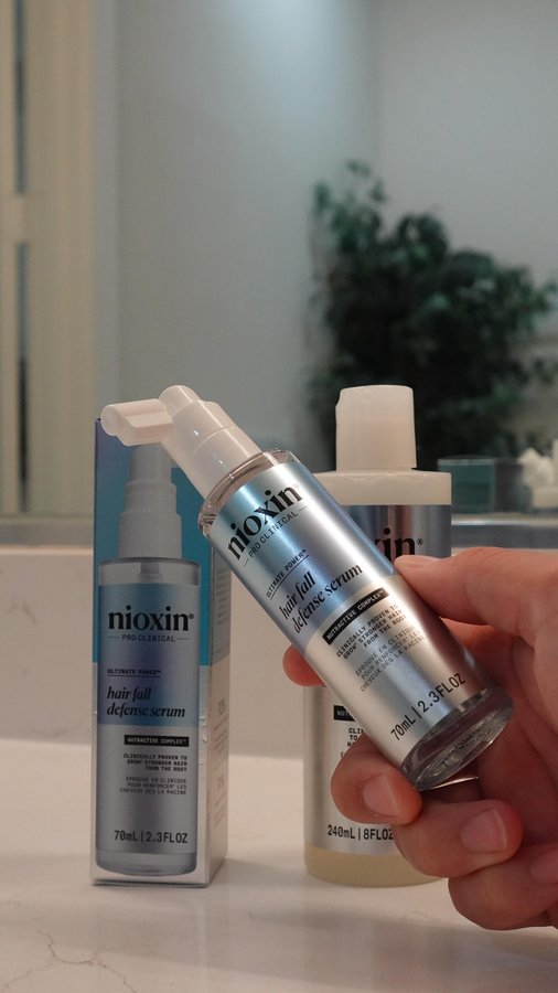 Instagram post by @lazizbaldwin for NIOXIN. Caption reads: Been losing way too much hair lately… So I’m....