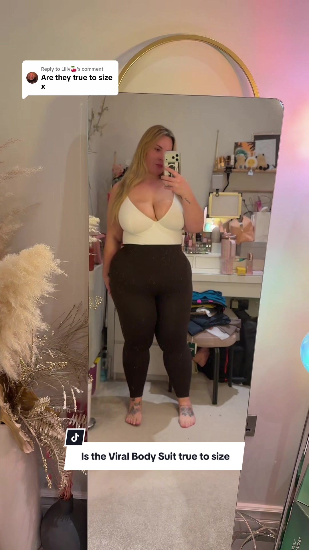 TikTok post by @burcibaci for Feelingirl. Caption reads: [...] @Lilly🍒 I hope this helps! @FeelinGirl LLC....