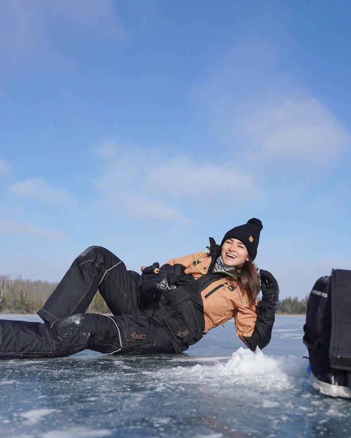 Instagram post by @nattieupnorth for DSG Outerwear. Caption reads: Smiling when it's eight degrees with gale-force....