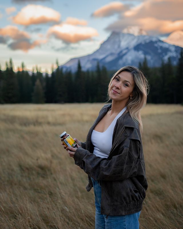 Instagram post by @cassidy.hornberger for MegaFood. Caption reads: Feeling amazing in the Canadian Rockies....