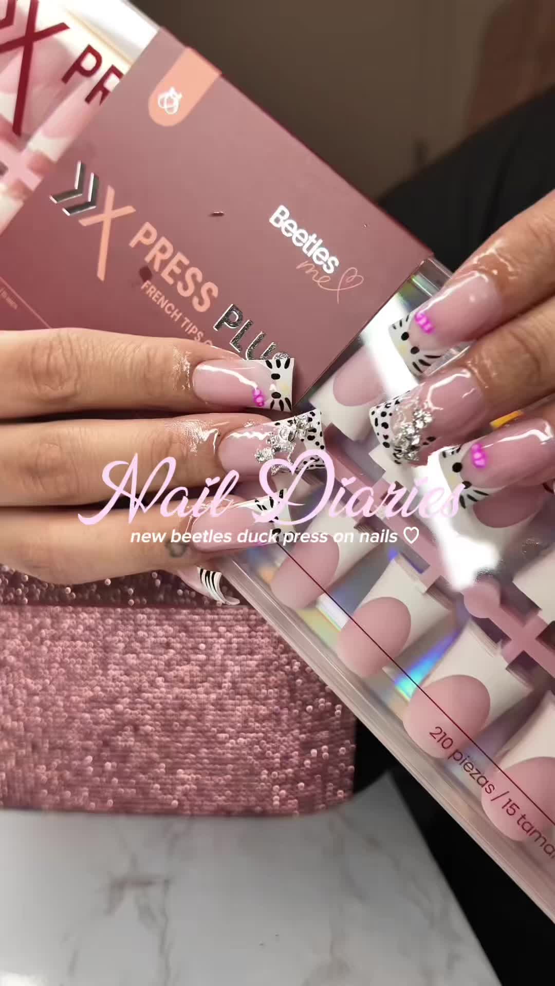 TikTok post by @rashellthadoll for BeetlesGelPolish. Caption reads: NEW beetles press on nails alert baddies!!🚨....